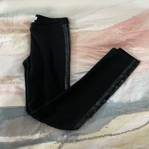 Calvin Klein size 4 black pointe pants with pleather side stripes